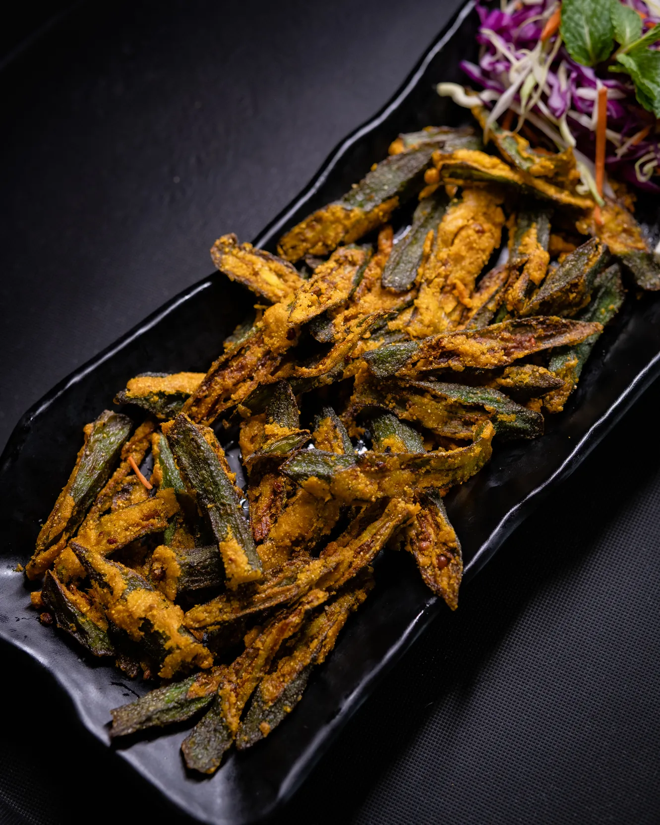 Kurkuri bhindi, crisp fried okra strips dusted with masala
